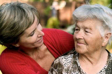 Daughter talking to aging parent about assisted living option